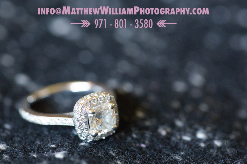 engagement ring with round cut diamond in a halo setting